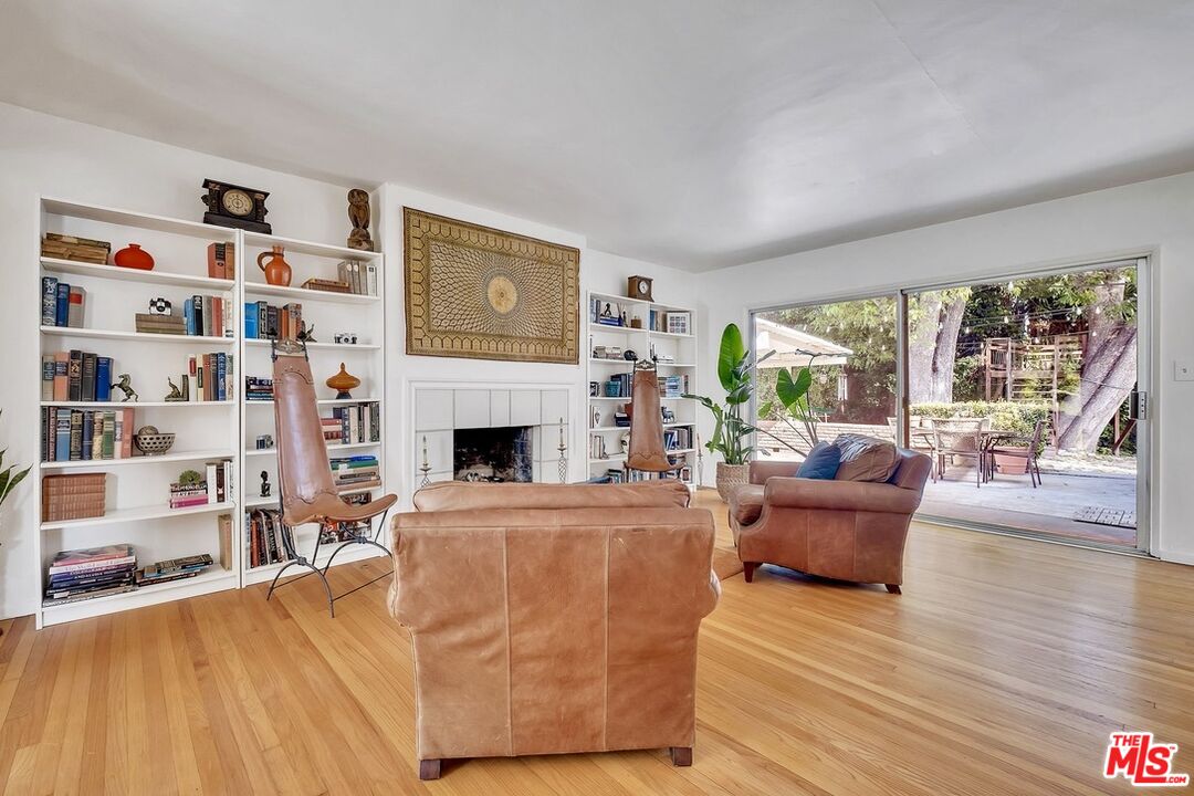 49 Ranchview Road Rolling Hills Estates, CA 90274 - Photo 7 of 49 a living room with furniture and a fireplace