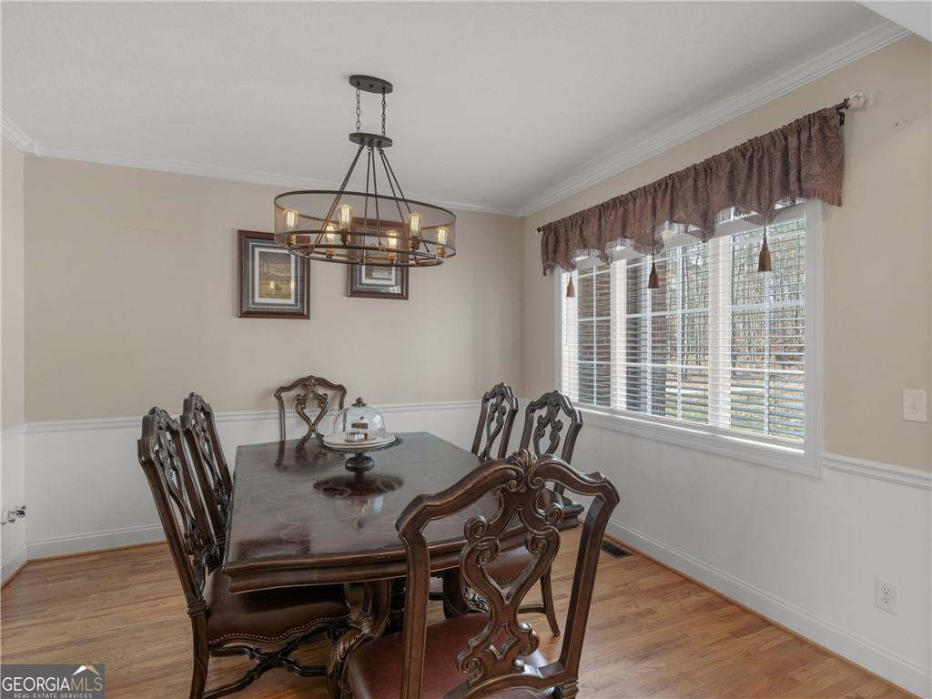 355 Parker Road Covington, GA 30014 - Photo 20 of 60 a view of a dining room with furniture window and outside view
