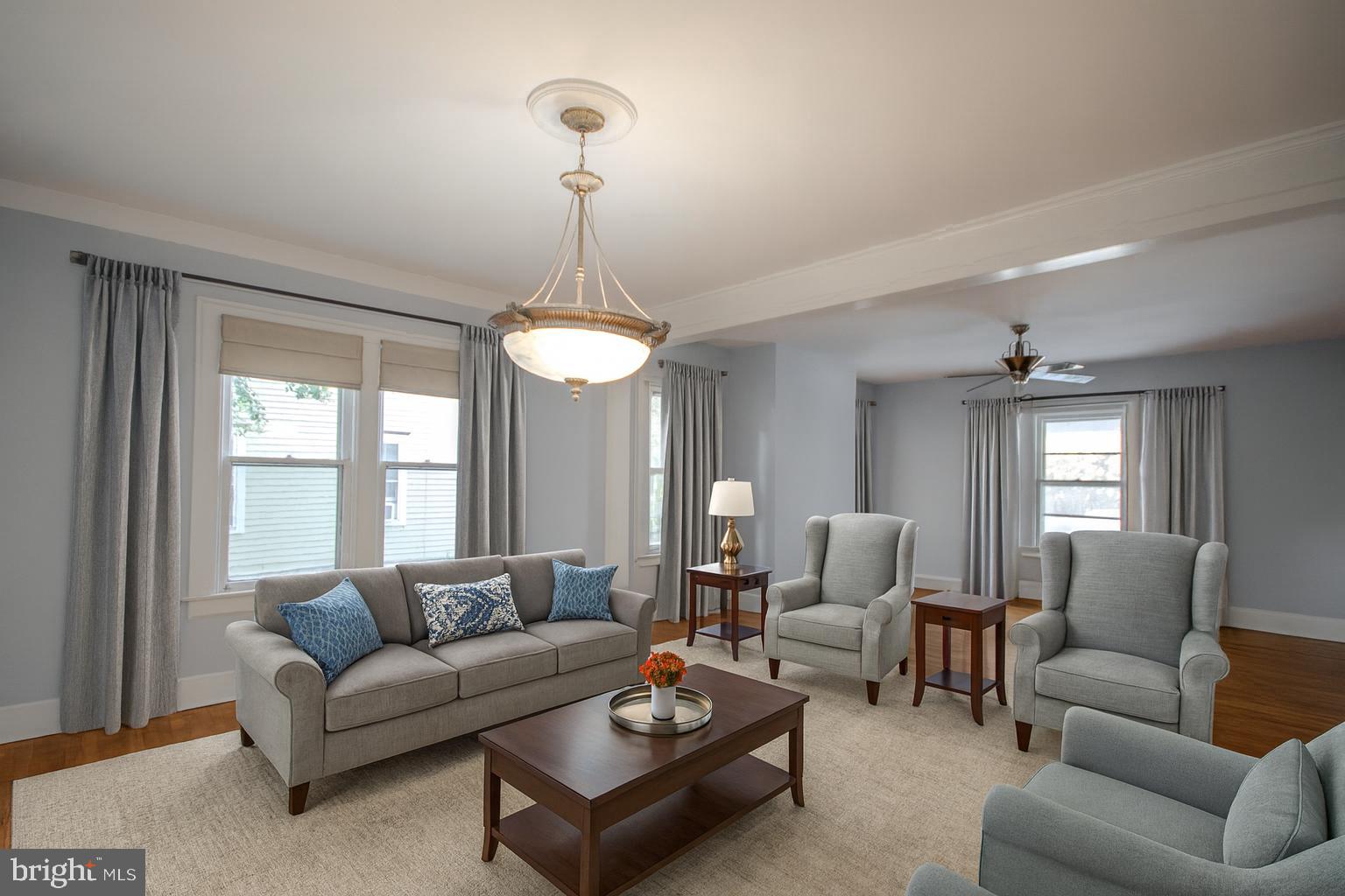309 Gay Street Salisbury, MD 21801 - Photo 11 of 54 a living room with furniture and a chandelier