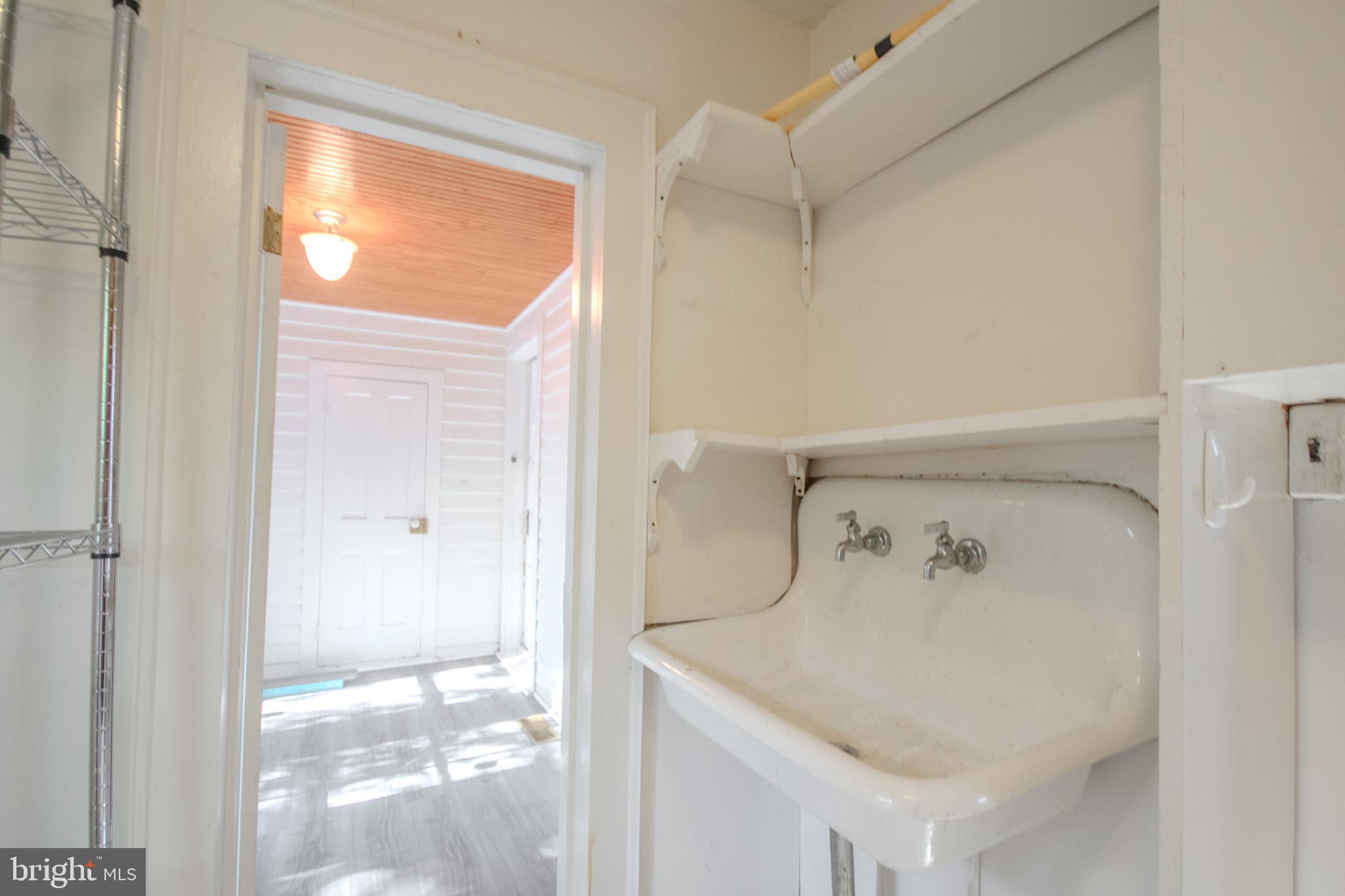 309 Gay Street Salisbury, MD 21801 - Photo 21 of 54 a bathroom with a bathtub