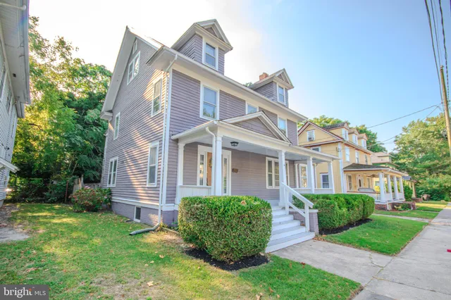front view of a house and a yard