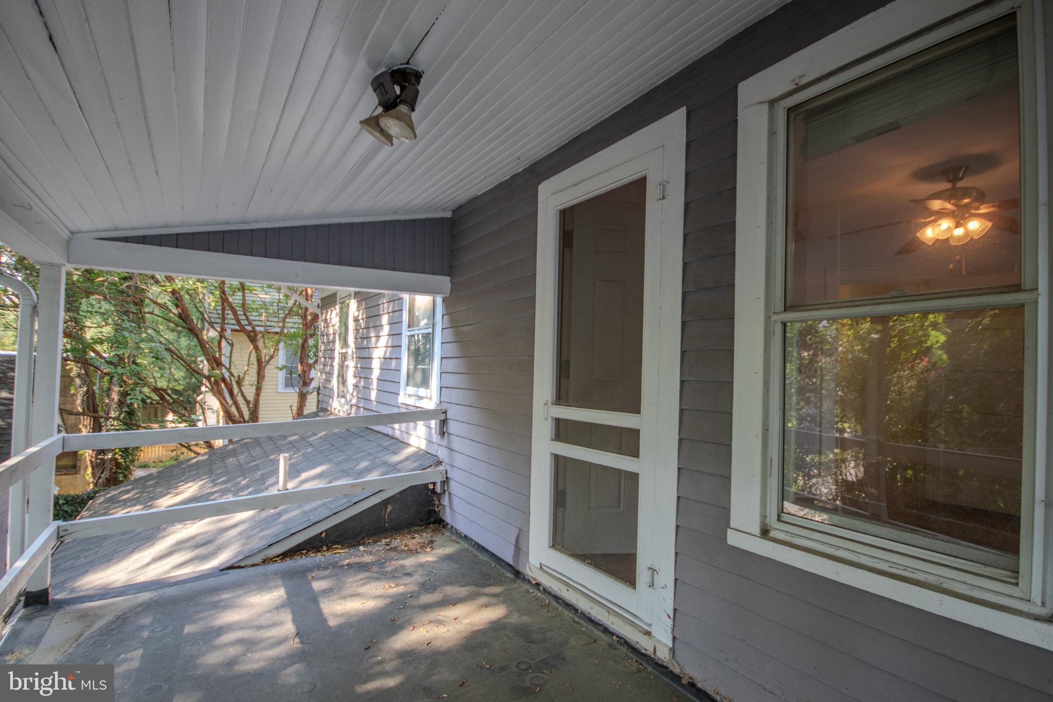 309 Gay Street Salisbury, MD 21801 - Photo 32 of 54 a bedroom with a bed and large window