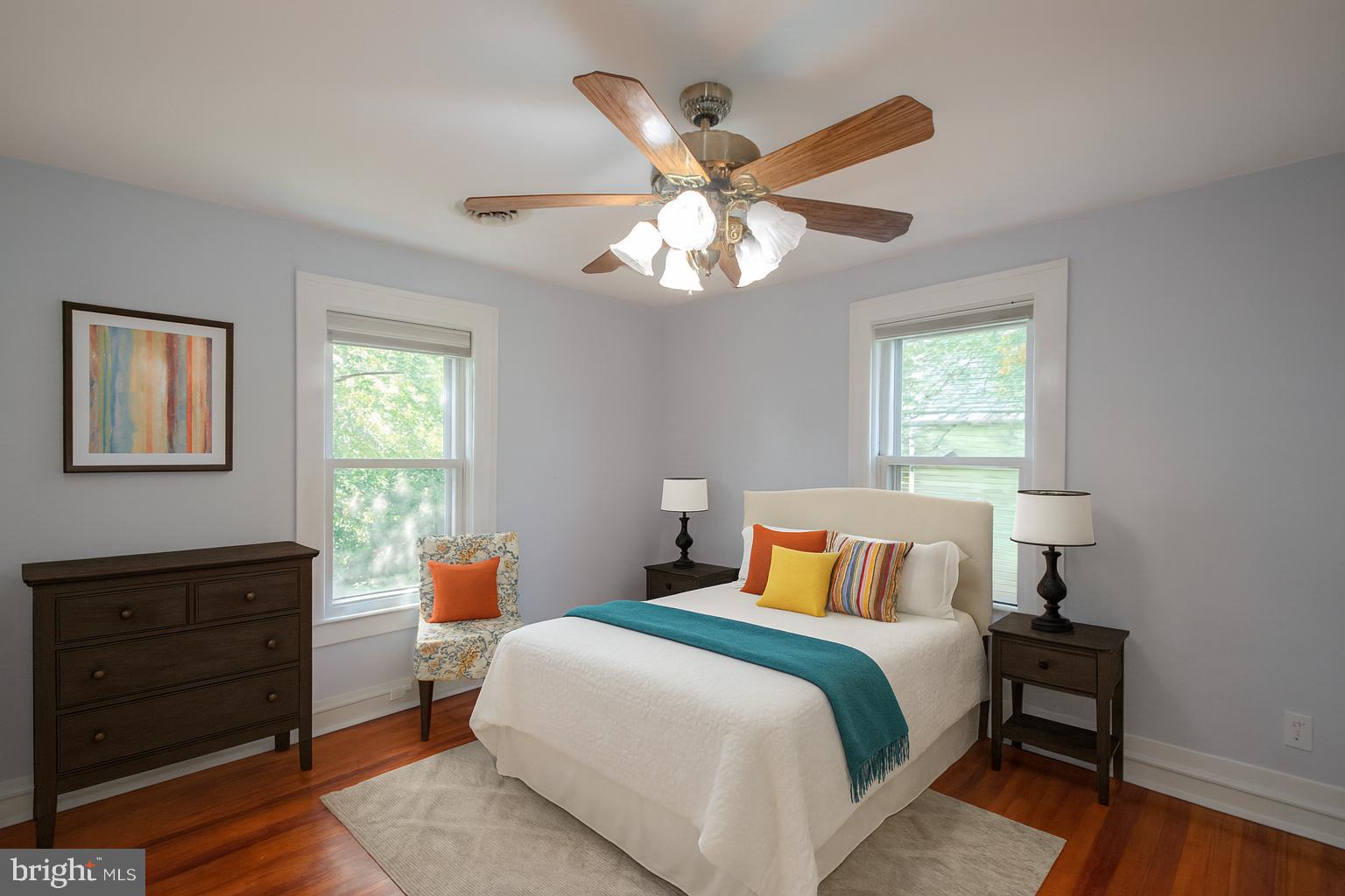 309 Gay Street Salisbury, MD 21801 - Photo 35 of 54 a bedroom with a bed and wooden floor