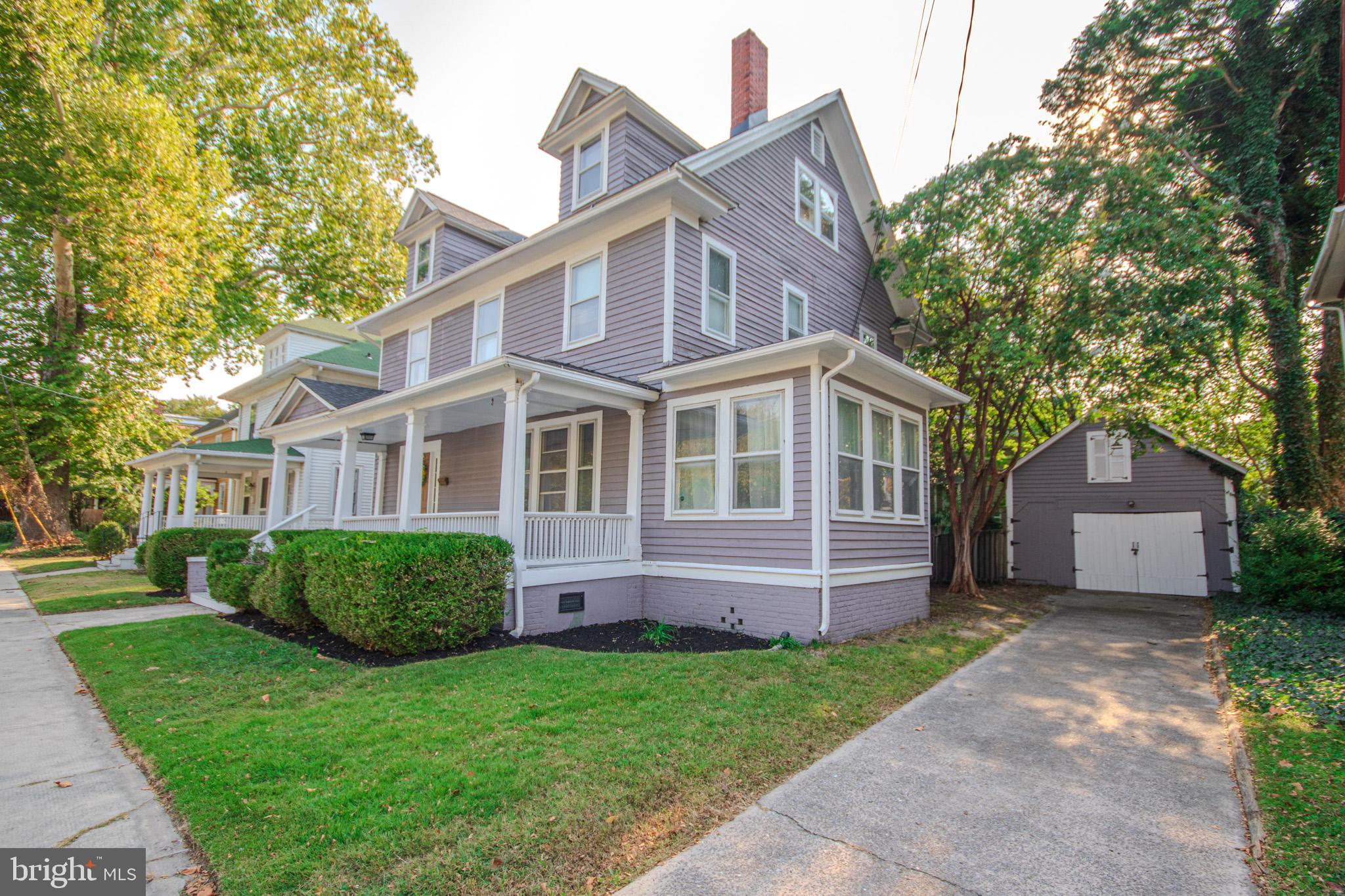 309 Gay Street Salisbury, MD 21801 - Photo 4 of 54 a front view of a house with a garden