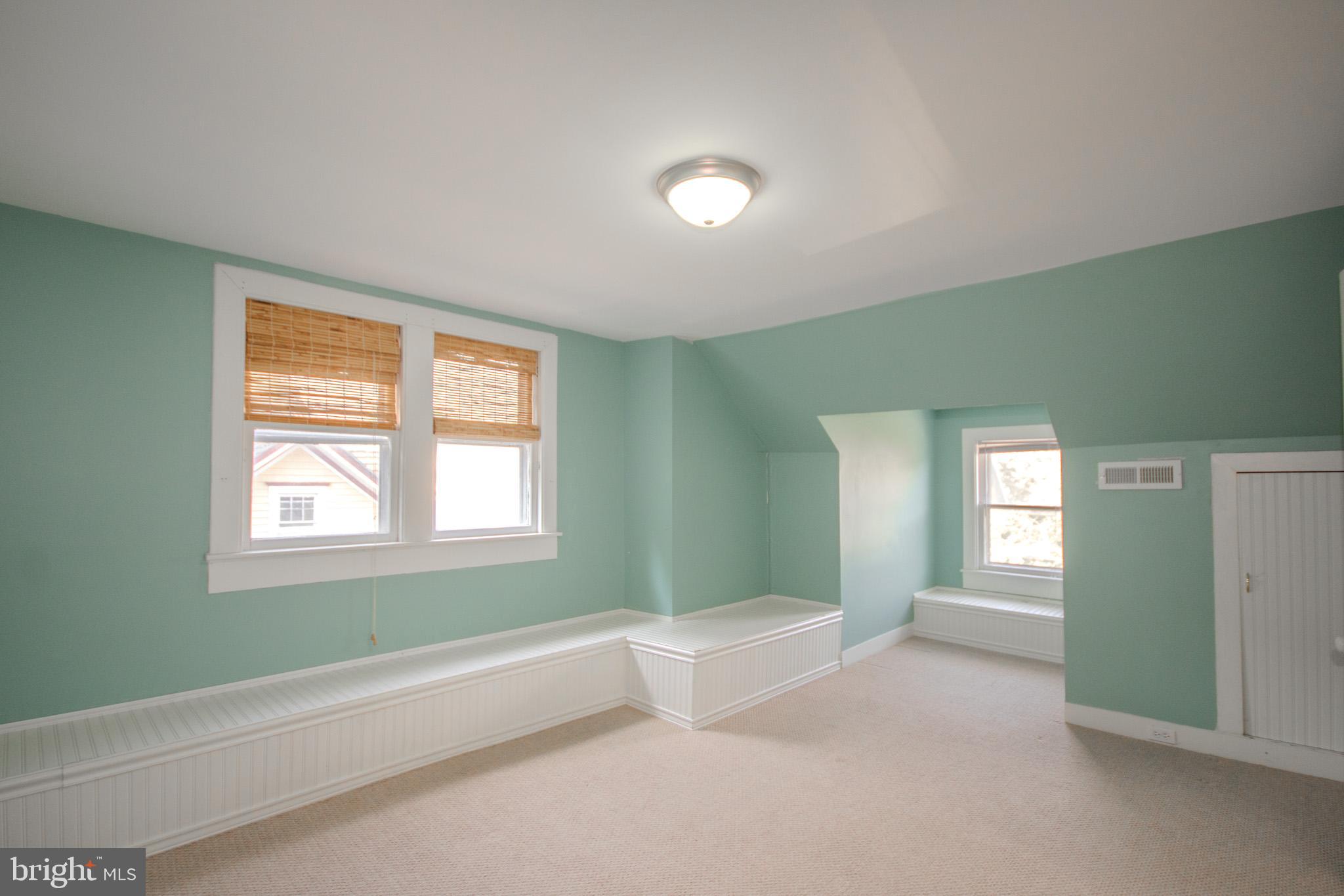 309 Gay Street Salisbury, MD 21801 - Photo 42 of 54 a spacious bedroom with a bed and window
