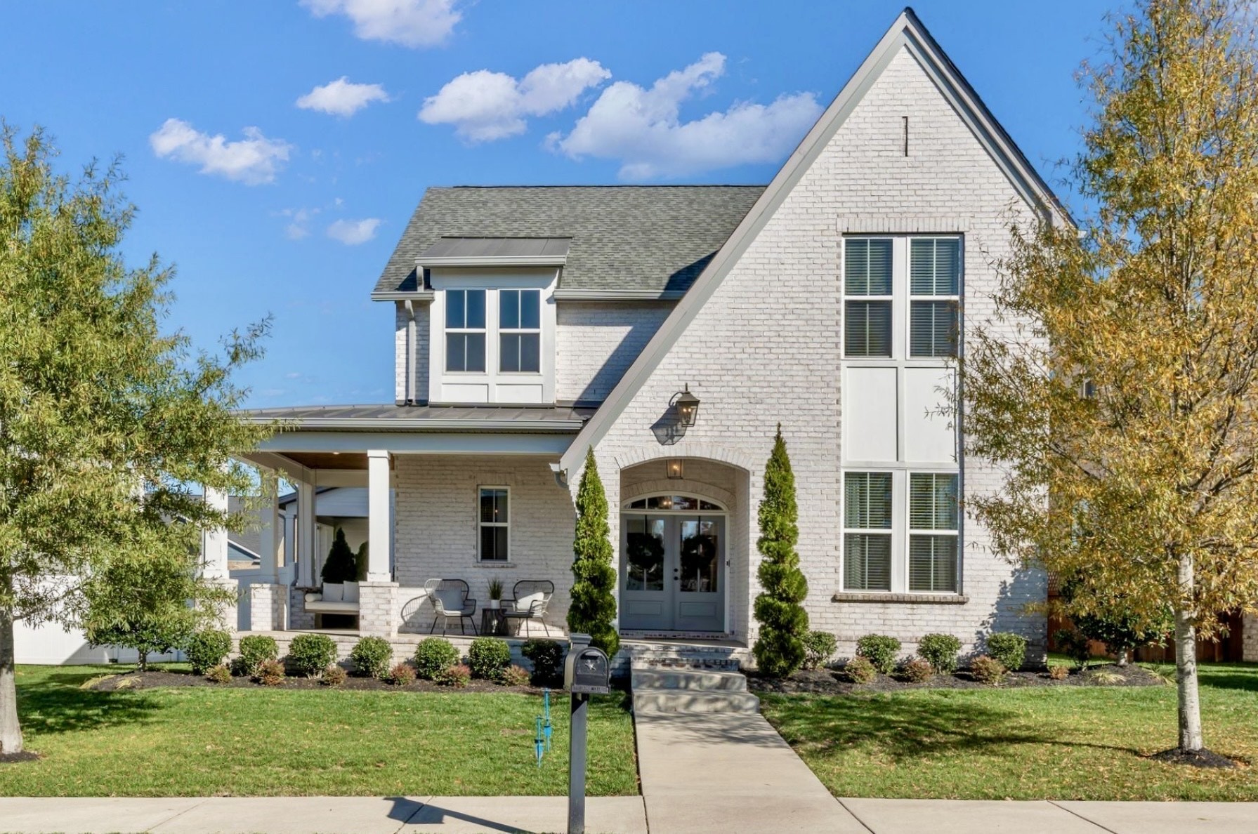 368 Azalea Circle Hendersonville, TN 37075 - Photo 1 of 61 a front view of a house with garden
