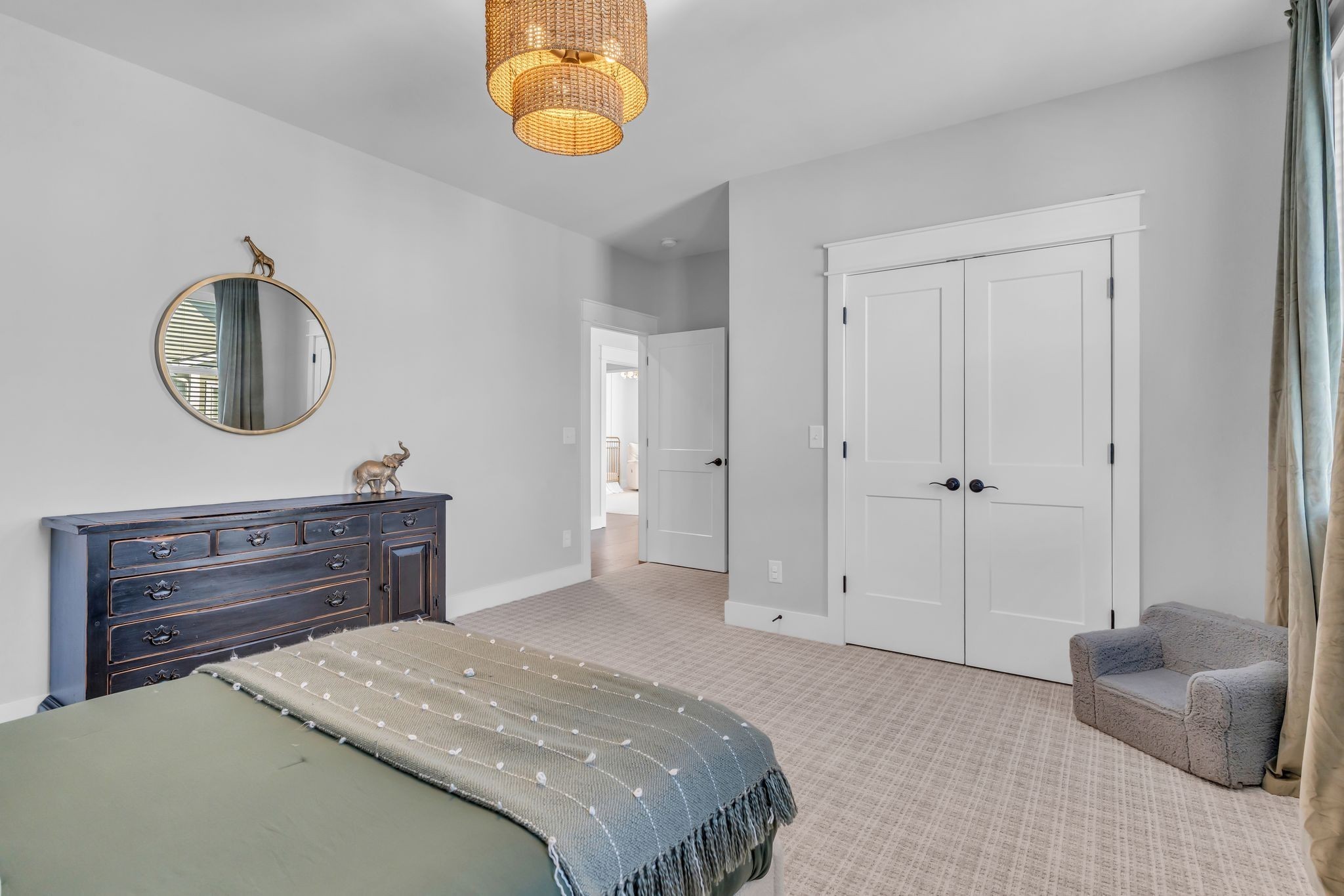 368 Azalea Circle Hendersonville, TN 37075 - Photo 40 of 61 a bedroom with a bed and a chandelier