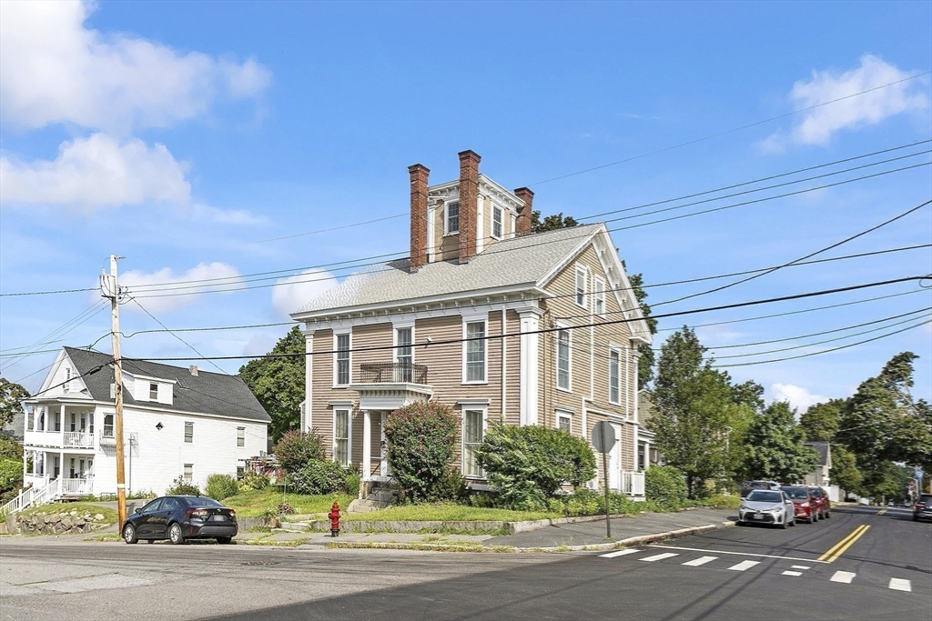 214 3rd Street, Unit A Lowell, MA 01850 - Photo 25 of 32 a view of a building with a street