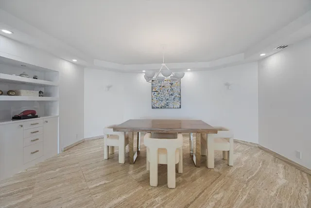 a room with furniture and wooden floor