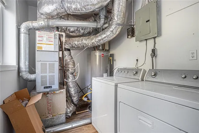 a utility room with dryer and washer