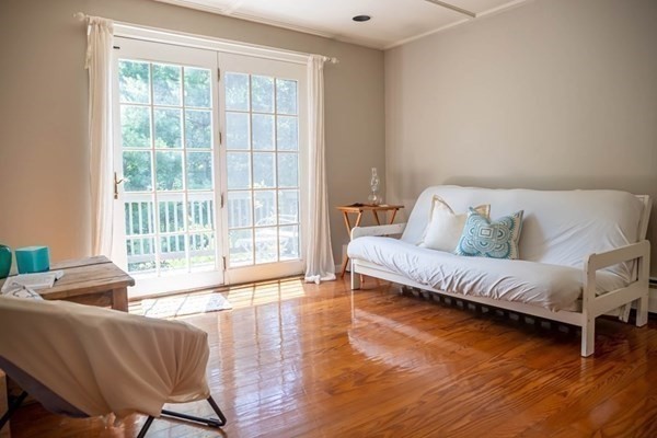 141 Hale Street, Unit 2 Beverly, MA 01915 - Photo 5 of 17 a living room with furniture and a large window