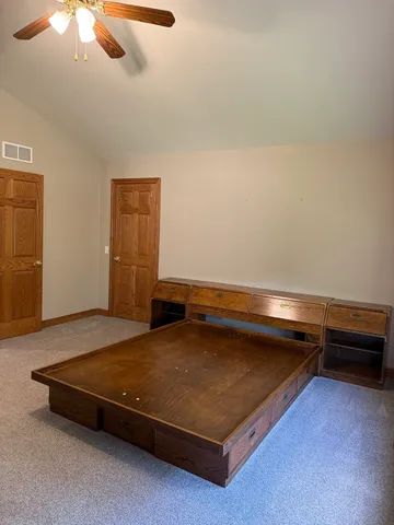 a view of an empty walk in closet