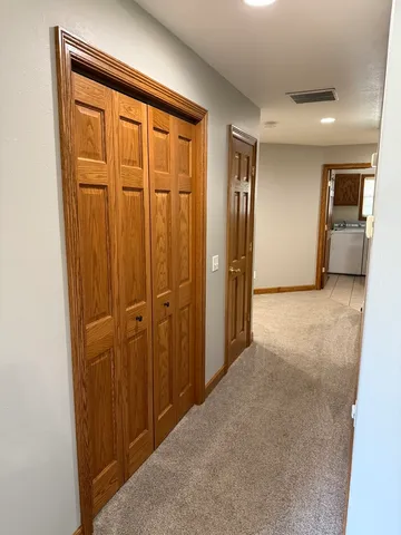 a bedroom with furniture and a ceiling fan