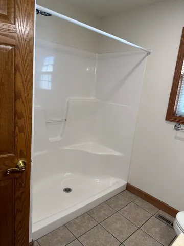 a view of an empty walk in closet