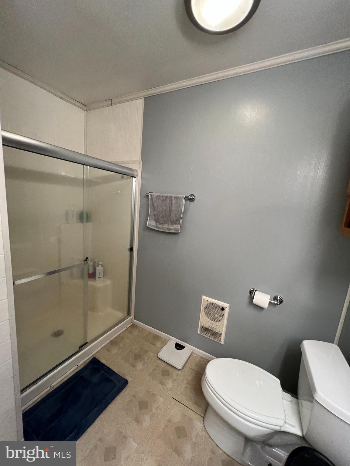 34788 Susan Beach Road Laurel, DE 19956 - Photo 25 of 36 a white toilet sitting next to a bathroom sink