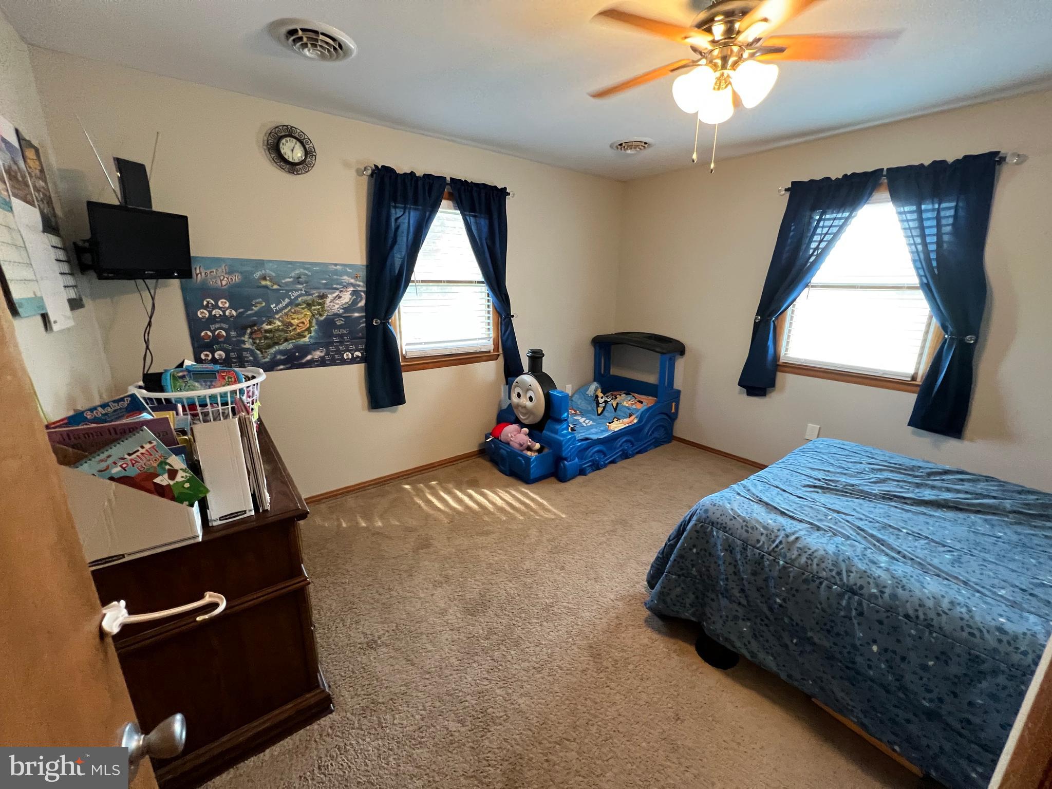 34788 Susan Beach Road Laurel, DE 19956 - Photo 27 of 36 a bedroom with bed and window