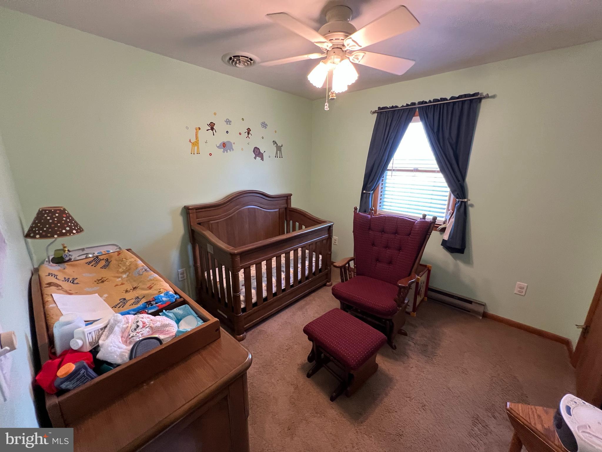 34788 Susan Beach Road Laurel, DE 19956 - Photo 28 of 36 a bedroom with furniture and a window