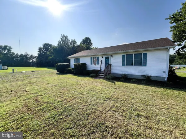 a view of a house with a big yard