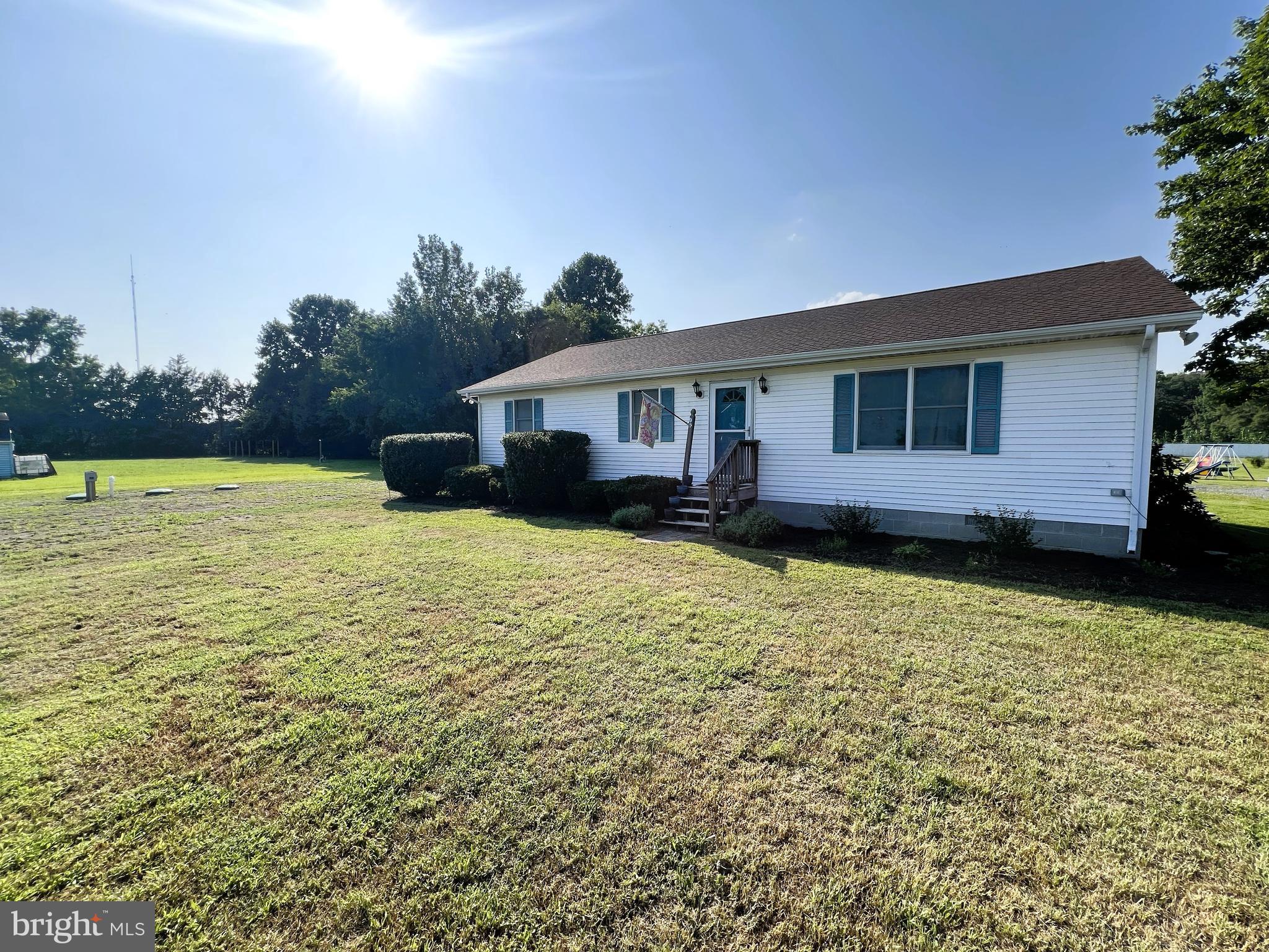34788 Susan Beach Road Laurel, DE 19956 - Photo 4 of 36 a view of a house with a big yard