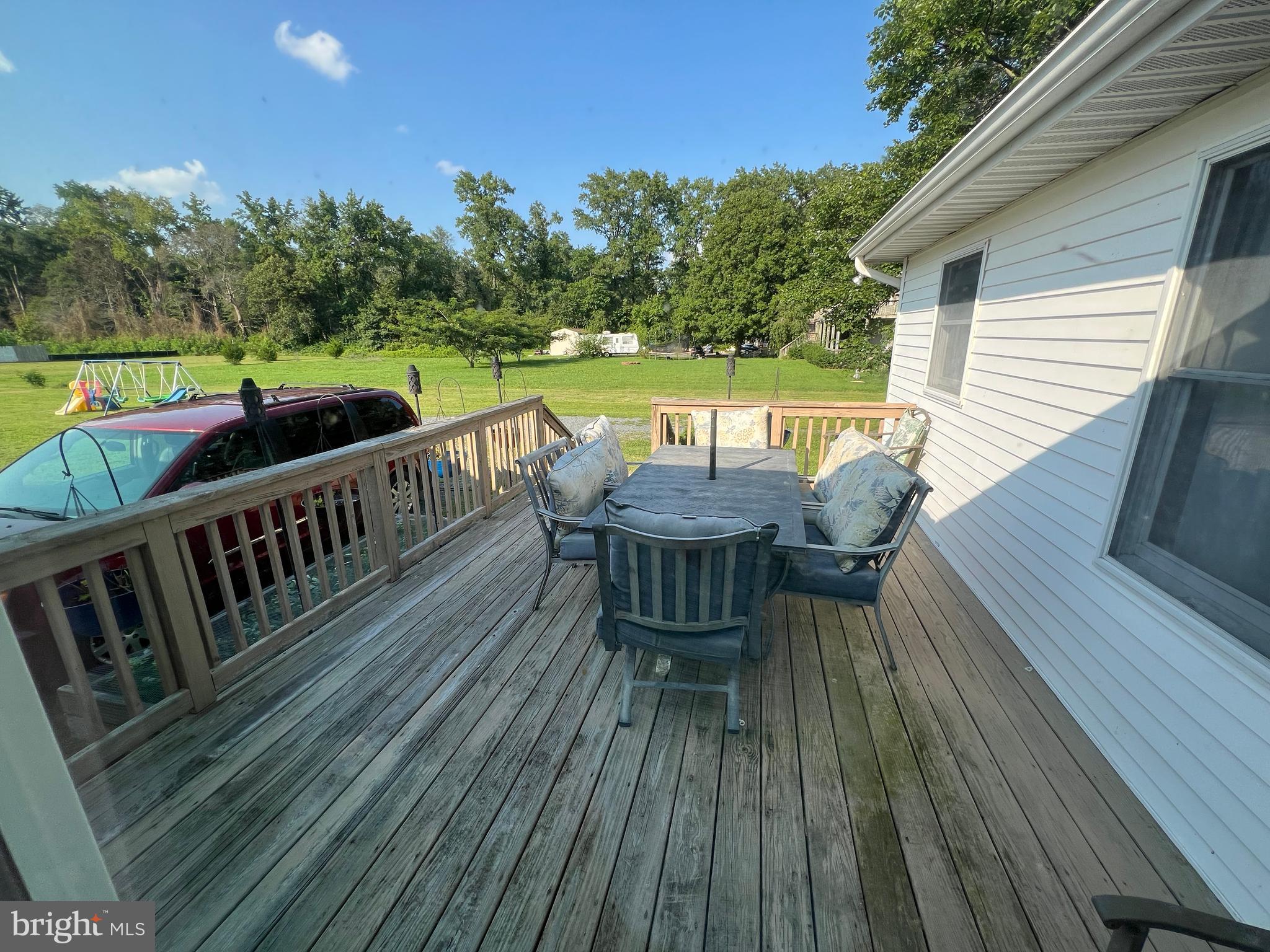 34788 Susan Beach Road Laurel, DE 19956 - Photo 7 of 36 a view of deck with patio