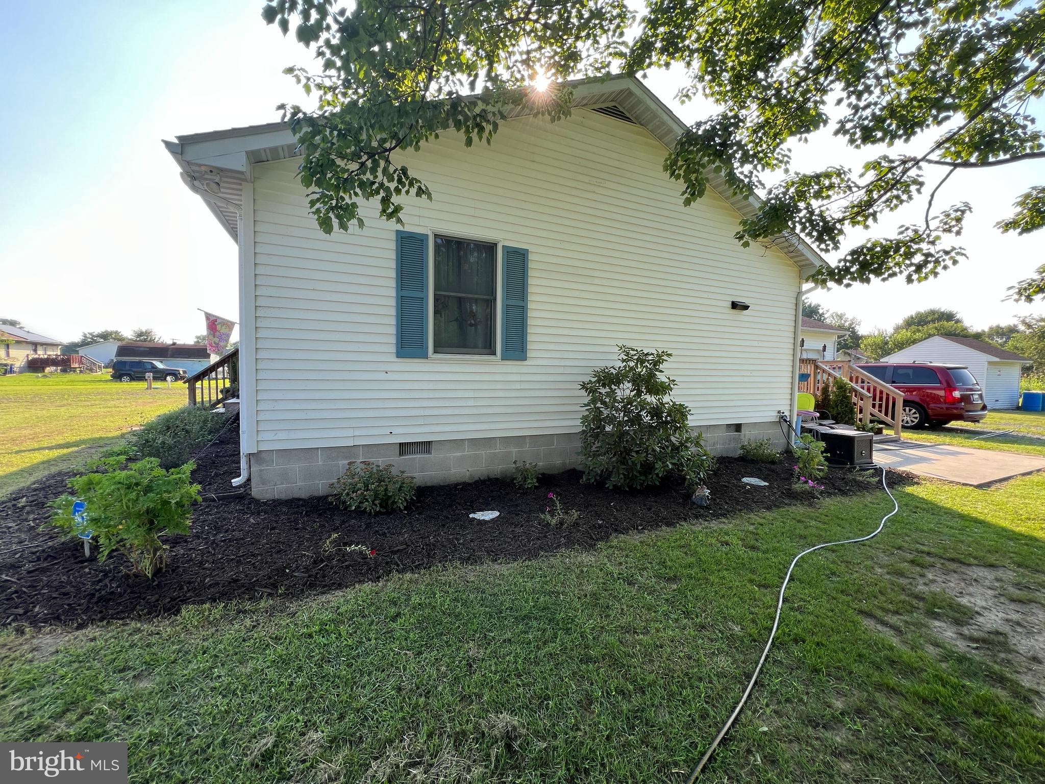 34788 Susan Beach Road Laurel, DE 19956 - Photo 8 of 36 a view of a house with backyard and sitting area