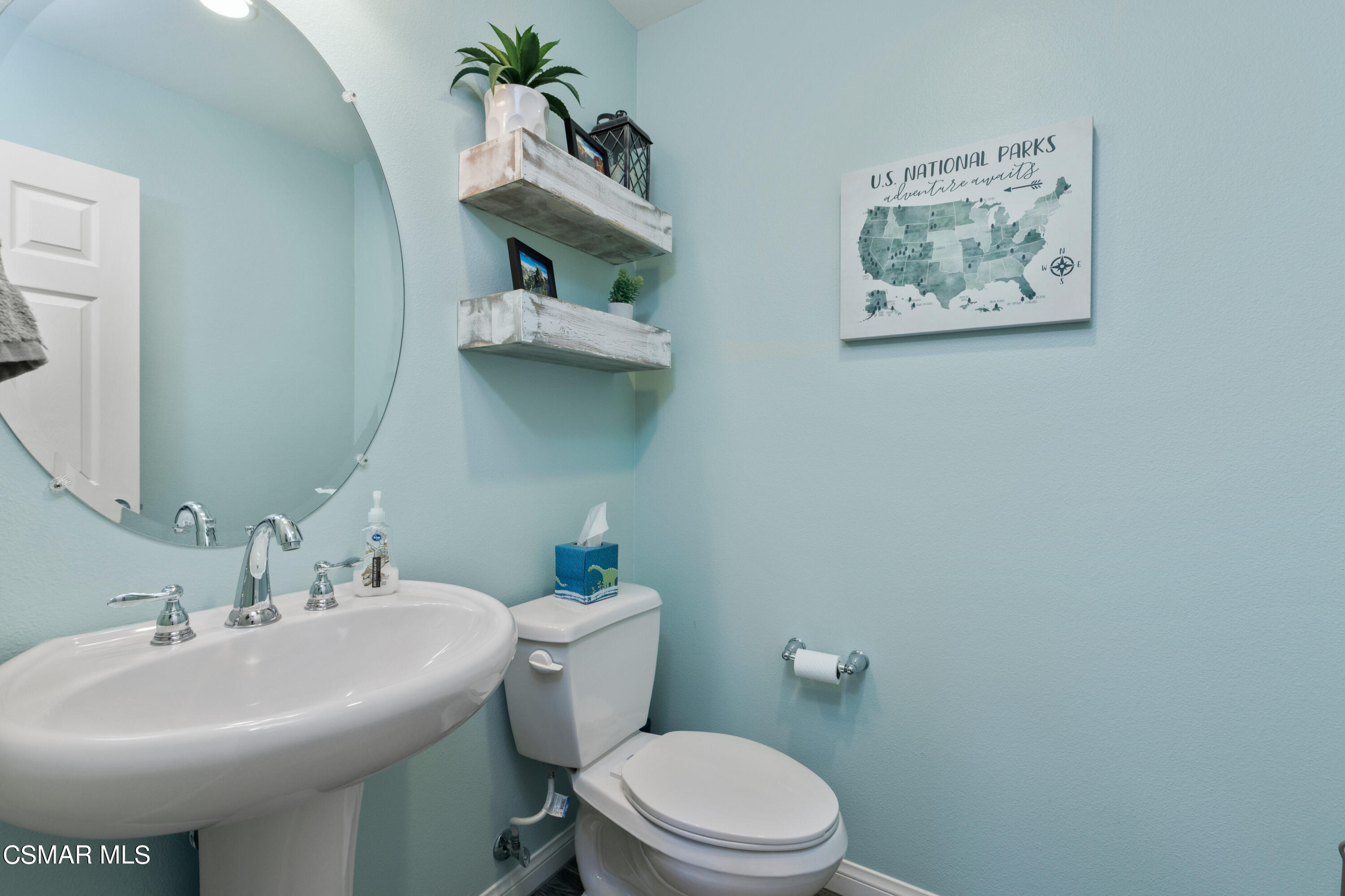 4893 Edenbridge Road Moorpark, CA 93021 - Photo 12 of 31 a bathroom with a sink mirror and toilet