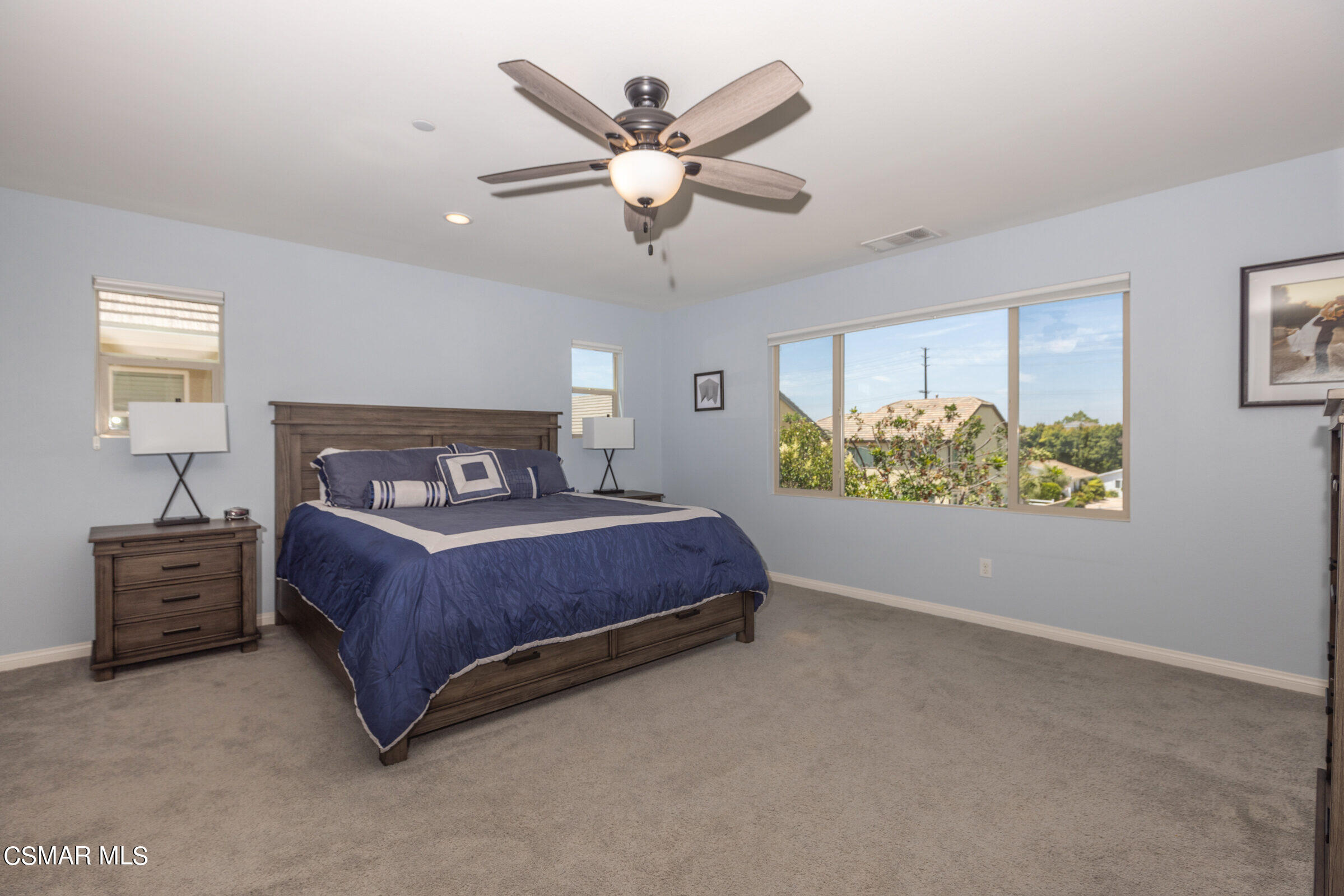 4893 Edenbridge Road Moorpark, CA 93021 - Photo 13 of 31 a bedroom with a bed and ceiling fan