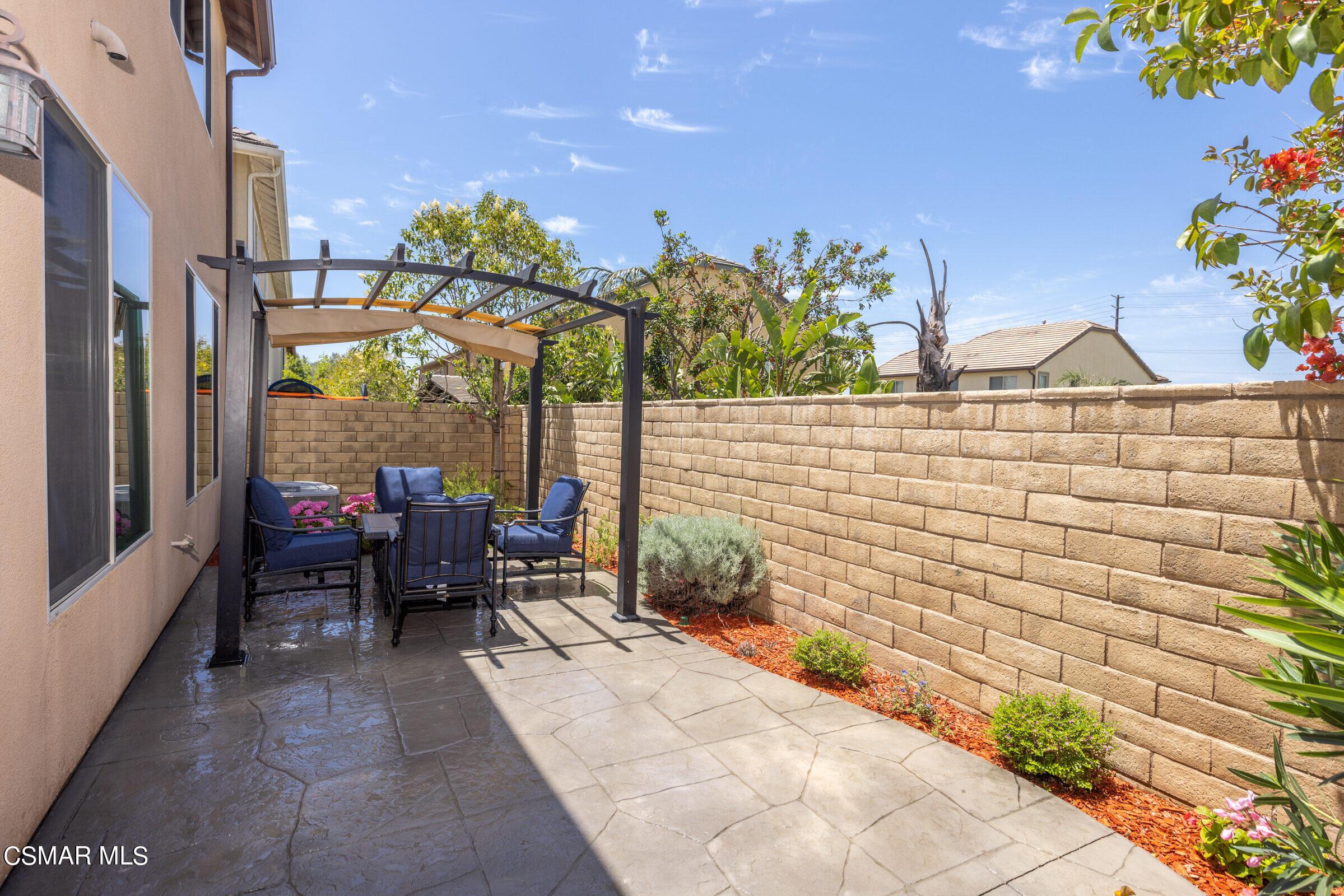 4893 Edenbridge Road Moorpark, CA 93021 - Photo 21 of 31 a backyard of a house with outdoor seating