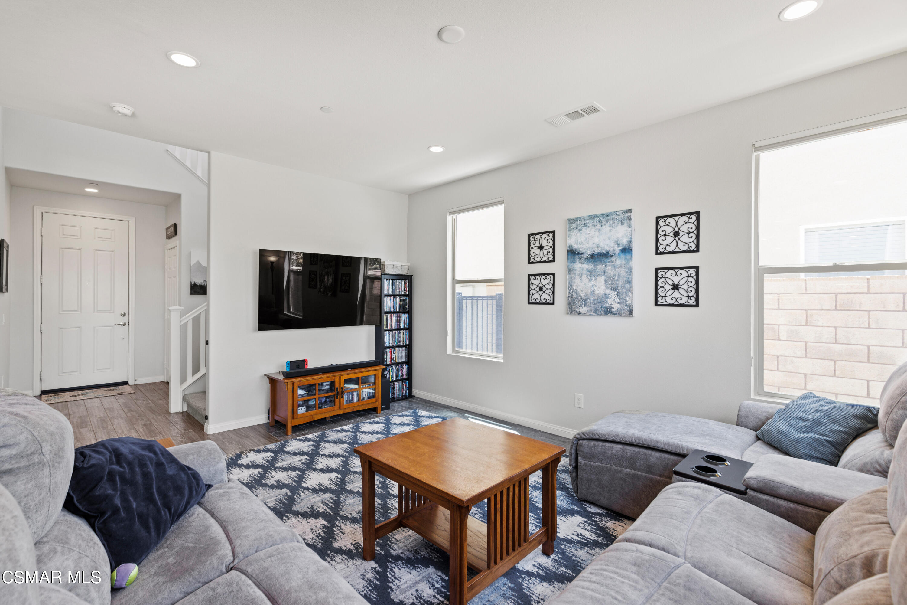 4893 Edenbridge Road Moorpark, CA 93021 - Photo 6 of 31 a living room with furniture and a flat screen tv