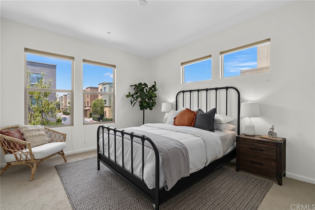 5429 Strand, Unit 101 Hawthorne, CA 90250 - Photo 11 of 39 a bedroom with a bed and a couch