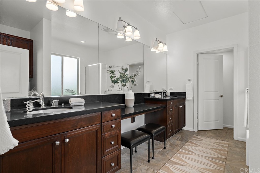 5429 Strand, Unit 101 Hawthorne, CA 90250 - Photo 17 of 39 a bathroom with a sink and a mirror