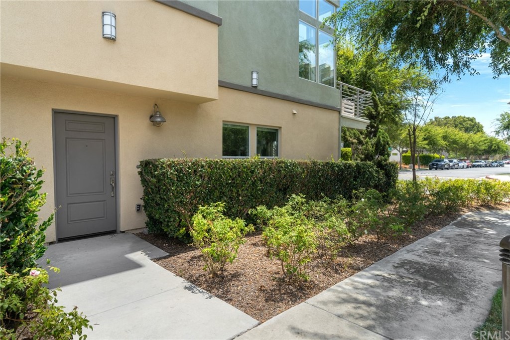 5429 Strand, Unit 101 Hawthorne, CA 90250 - Photo 21 of 39 a front view of a house with garden