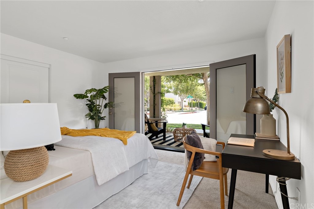 5429 Strand, Unit 101 Hawthorne, CA 90250 - Photo 23 of 39 a bedroom with furniture and a window