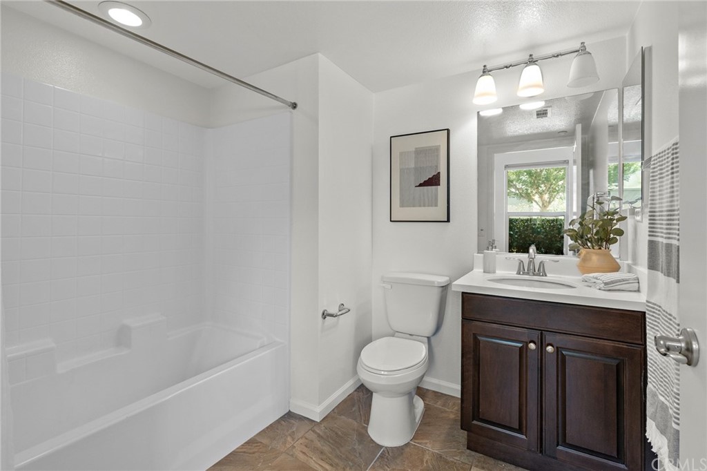 5429 Strand, Unit 101 Hawthorne, CA 90250 - Photo 25 of 39 a bathroom with a sink a toilet and shower