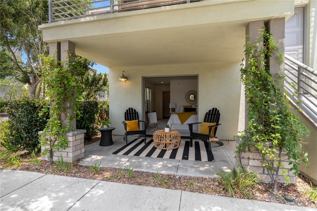 5429 Strand, Unit 101 Hawthorne, CA 90250 - Photo 26 of 39 a backyard of a house with table and chairs