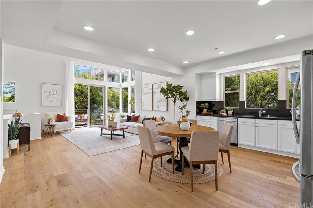 5429 Strand, Unit 101 Hawthorne, CA 90250 - Photo 9 of 39 a view of a dining room with furniture window and outside view