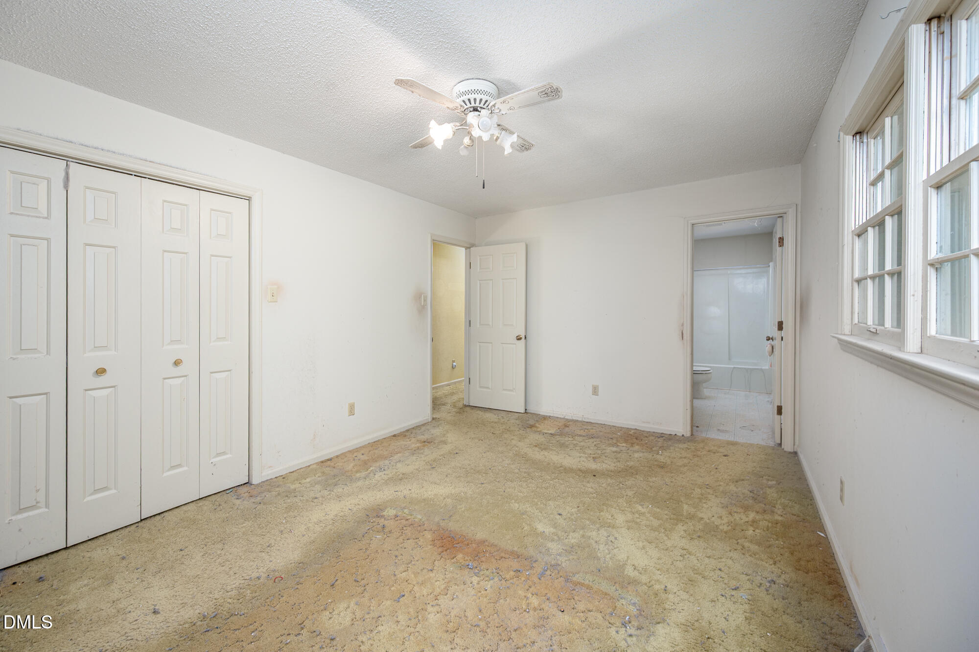 4411 Rhew Drive Durham, NC 27704 - Photo 24 of 34 a view of an empty room with a window