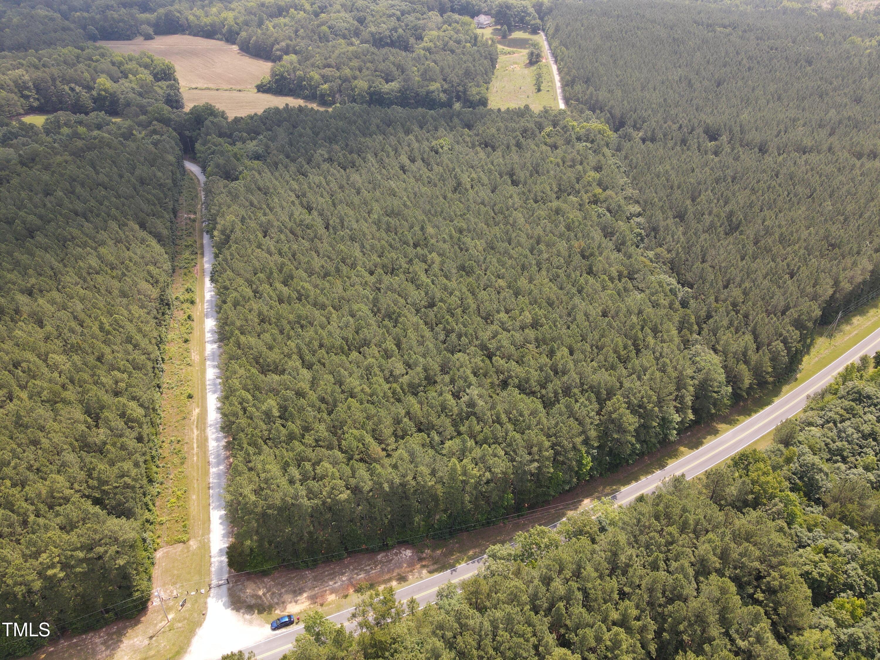 0 Shady Oak Road Roxboro, NC 27574 - Photo 2 of 18 a view of a pathway in a yard
