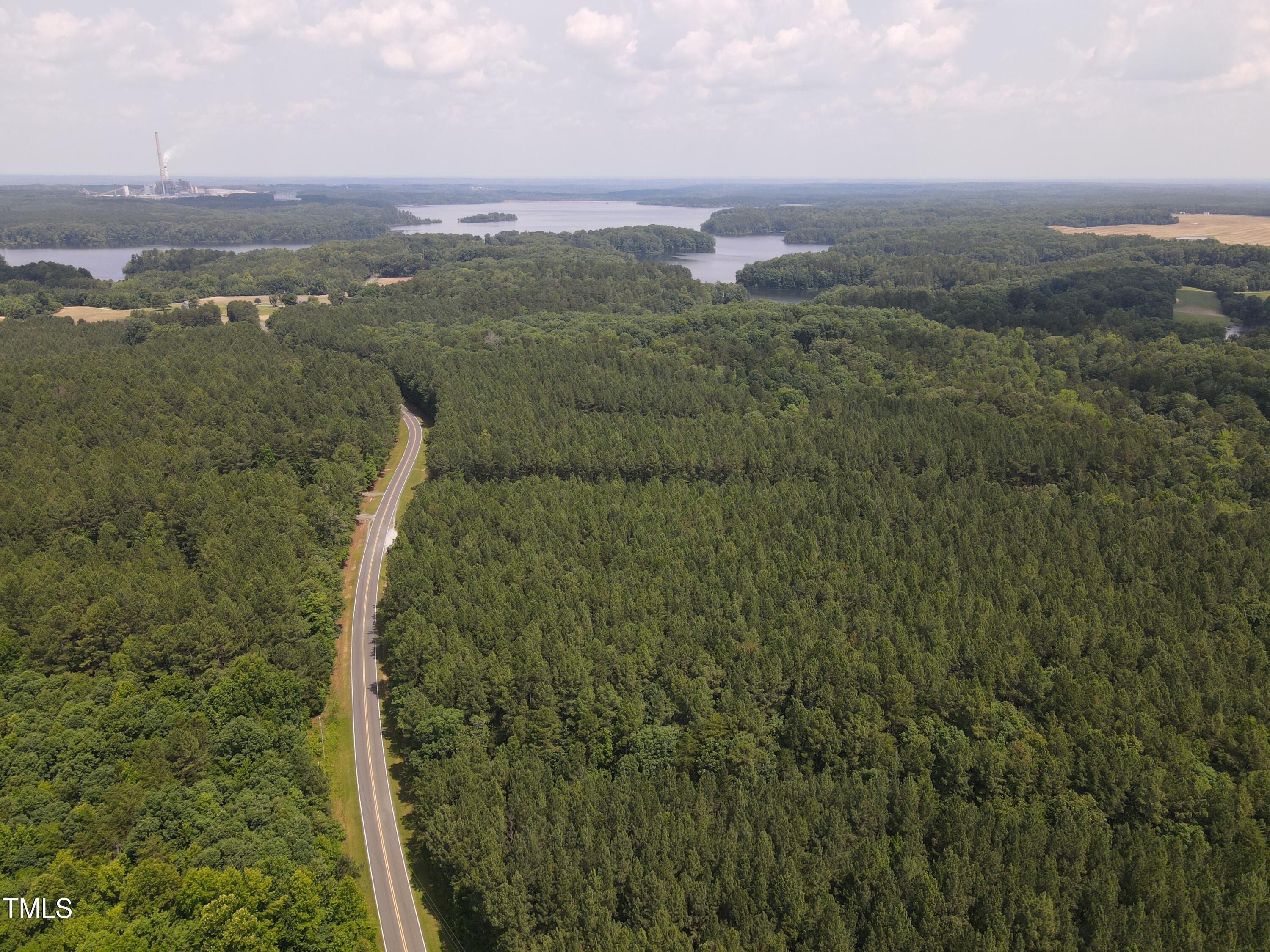 0 Shady Oak Road Roxboro, NC 27574 - Photo 6 of 18 a view of a city with lush green forest