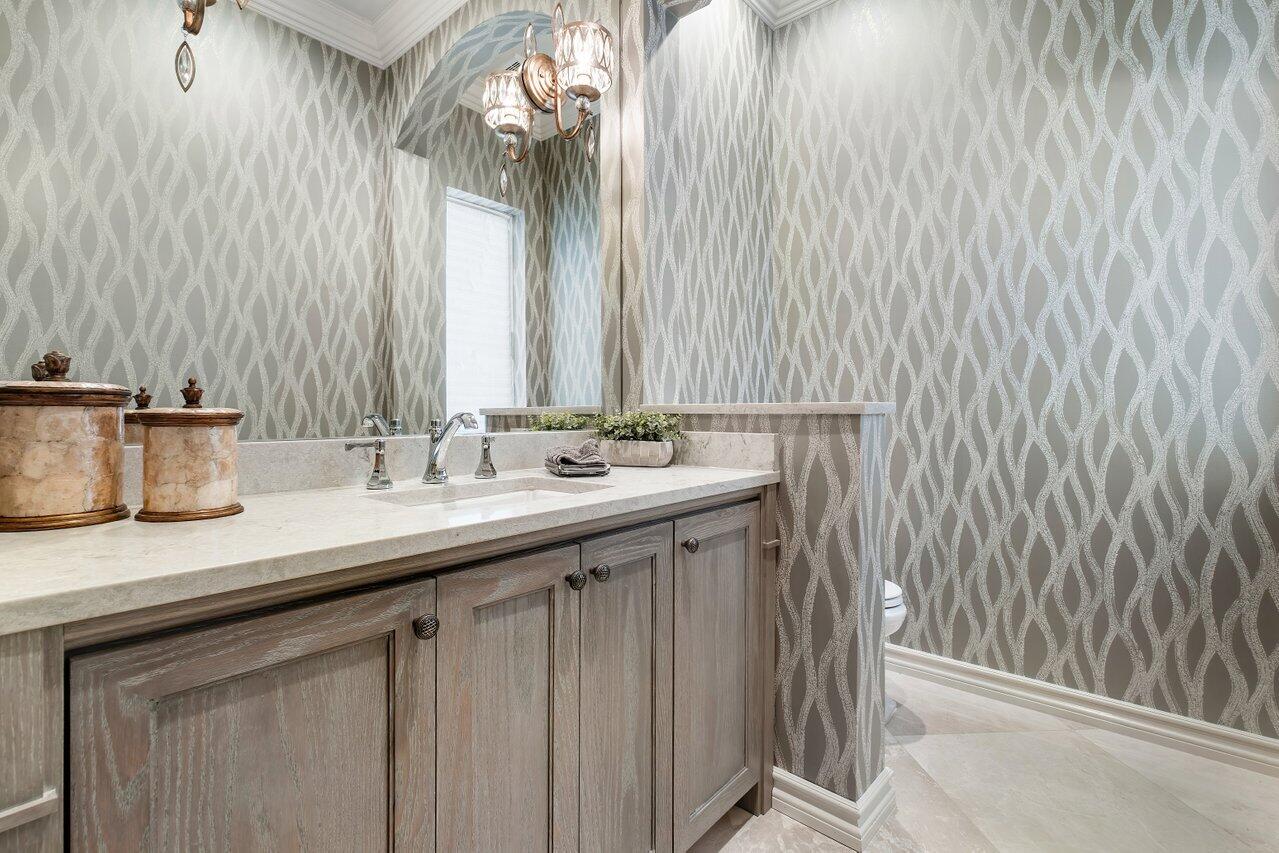 17526 Grand Este Way Boca Raton, FL 33496 - Photo 20 of 58 a bathroom with a sink and a mirror