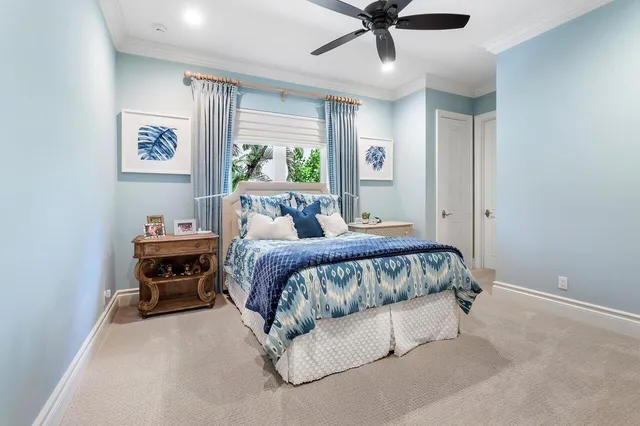 a dining room with furniture wooden floor and a potted plant