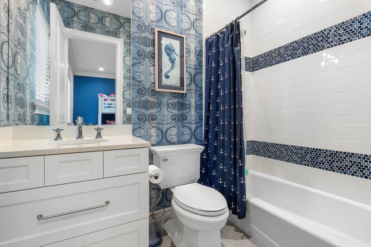 17526 Grand Este Way Boca Raton, FL 33496 - Photo 30 of 58 a bathroom with a sink a toilet and shower