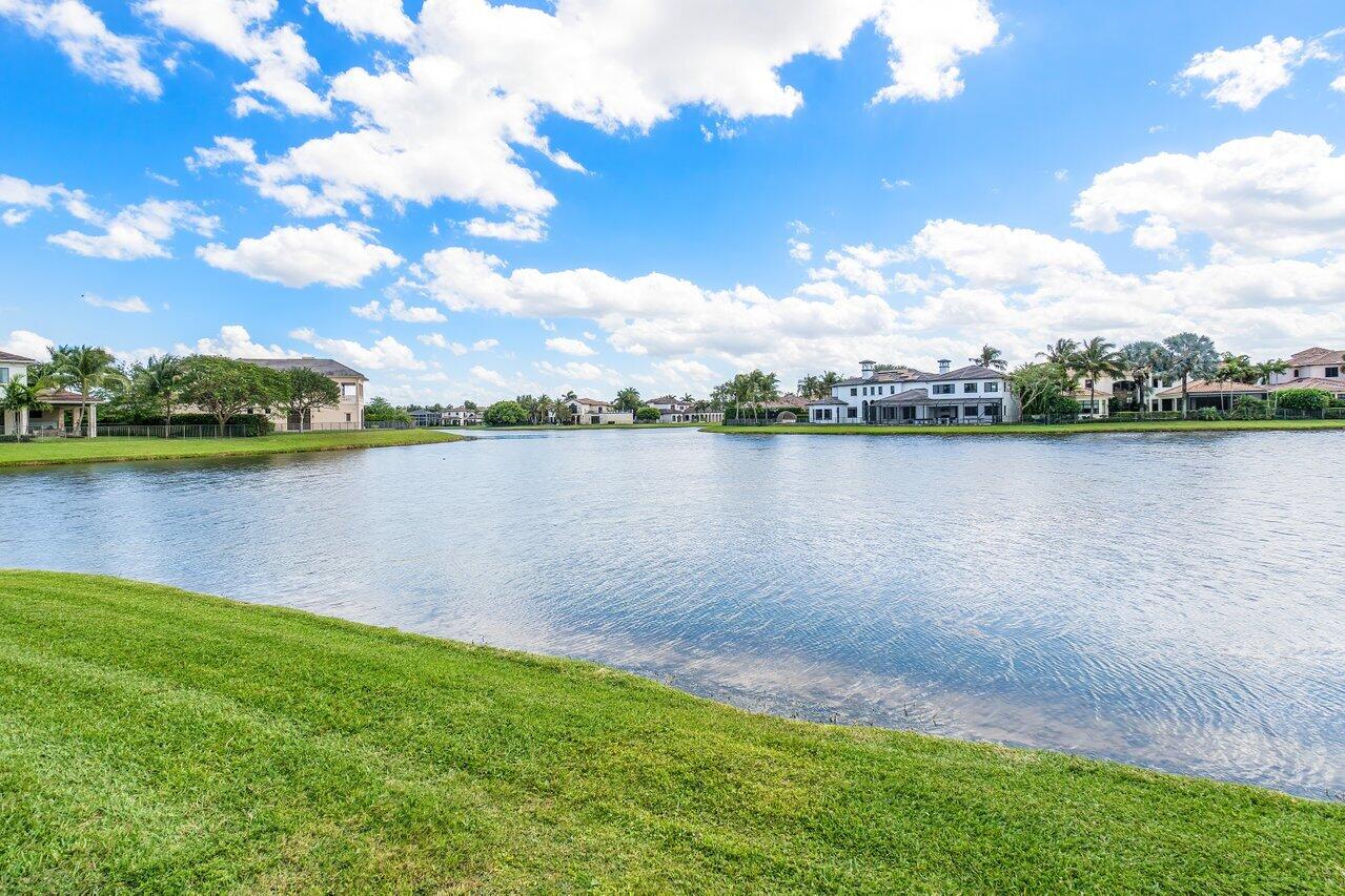 17526 Grand Este Way Boca Raton, FL 33496 - Photo 36 of 58 a view of a lake with houses in the back