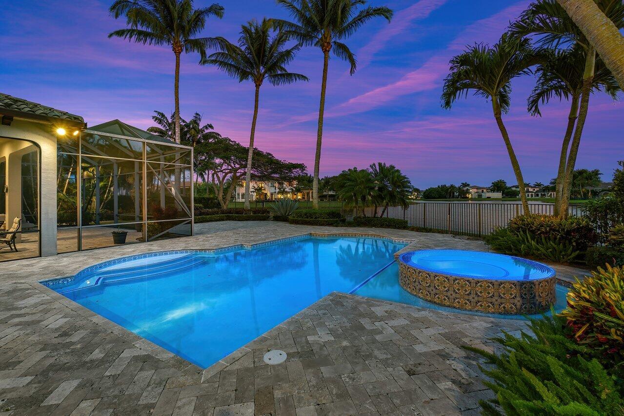 17526 Grand Este Way Boca Raton, FL 33496 - Photo 48 of 58 a view of a swimming pool with a house