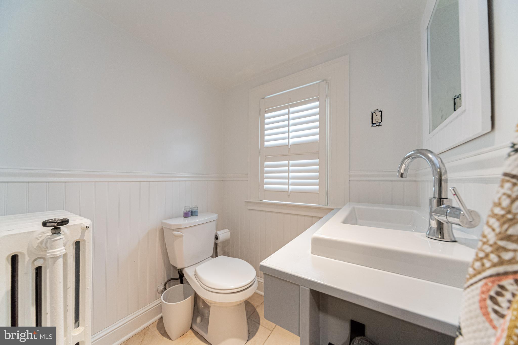 221 Hopkins Road Baltimore, MD 21212 - Photo 28 of 47 Renovated full bath on 3rd floor w/ full shower