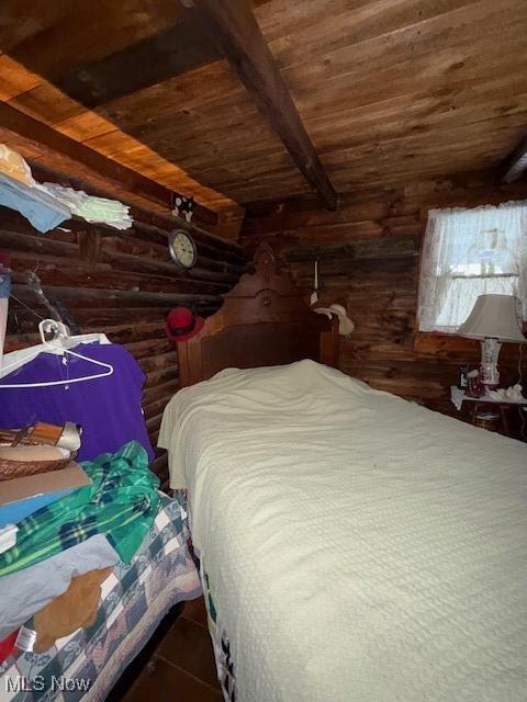 15639 Grove Road Southwest Port Washington, OH 43837 - Photo 23 of 31 Bedroom with a wooden ceiling with exposed beams