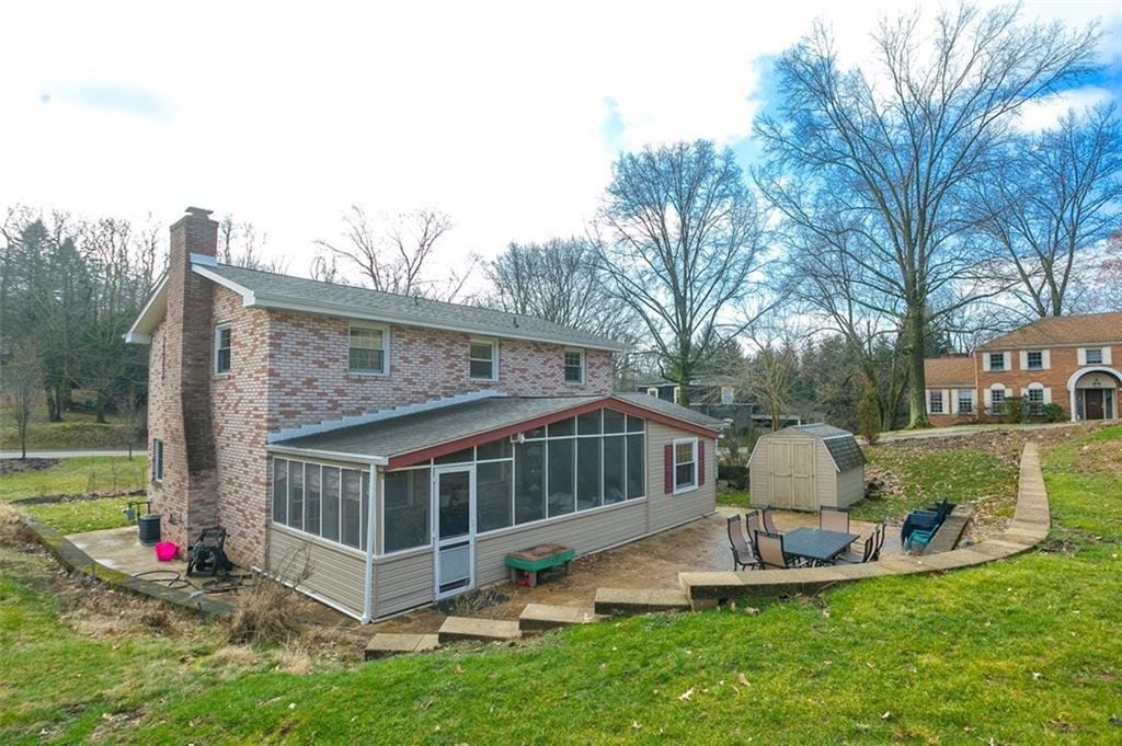 697 Filmore Road Pittsburgh, PA 15221 - Photo 33 of 42 a view of a house with a yard and sitting area