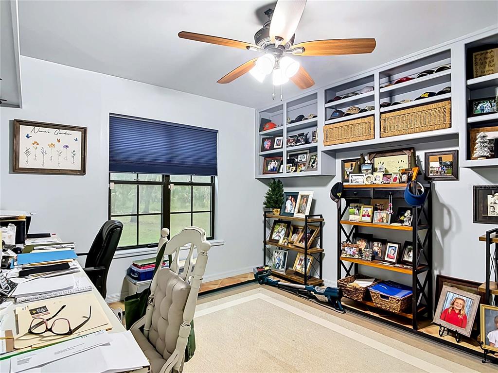 1395 Maytown Road Osteen, FL 32764 - Photo 43 of 65 a view of a workspace with furniture