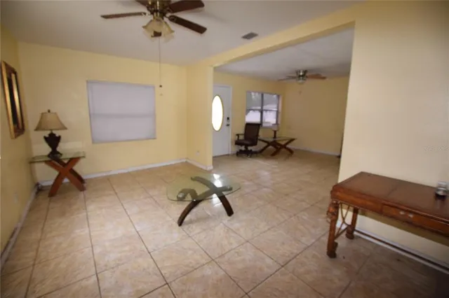a room with gym equipment and a glass window