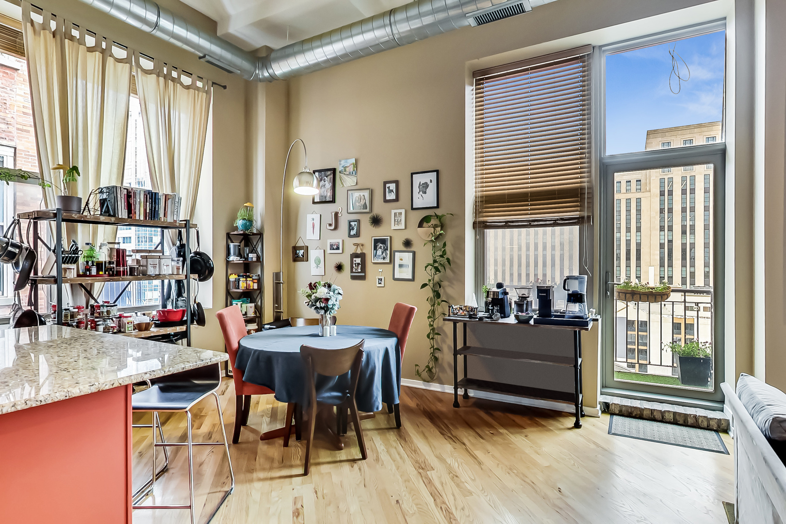 500 South Clinton Street, Unit 810 Chicago, IL 60607 - Photo 20 of 54 a dining room with furniture and a floor to ceiling window